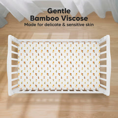 KeaBabies Isla fitted crib sheet on mattress shows snug fit and secure edge