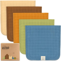 KeaBabies Lumi muslin burp cloth rolled for portable spill protection.