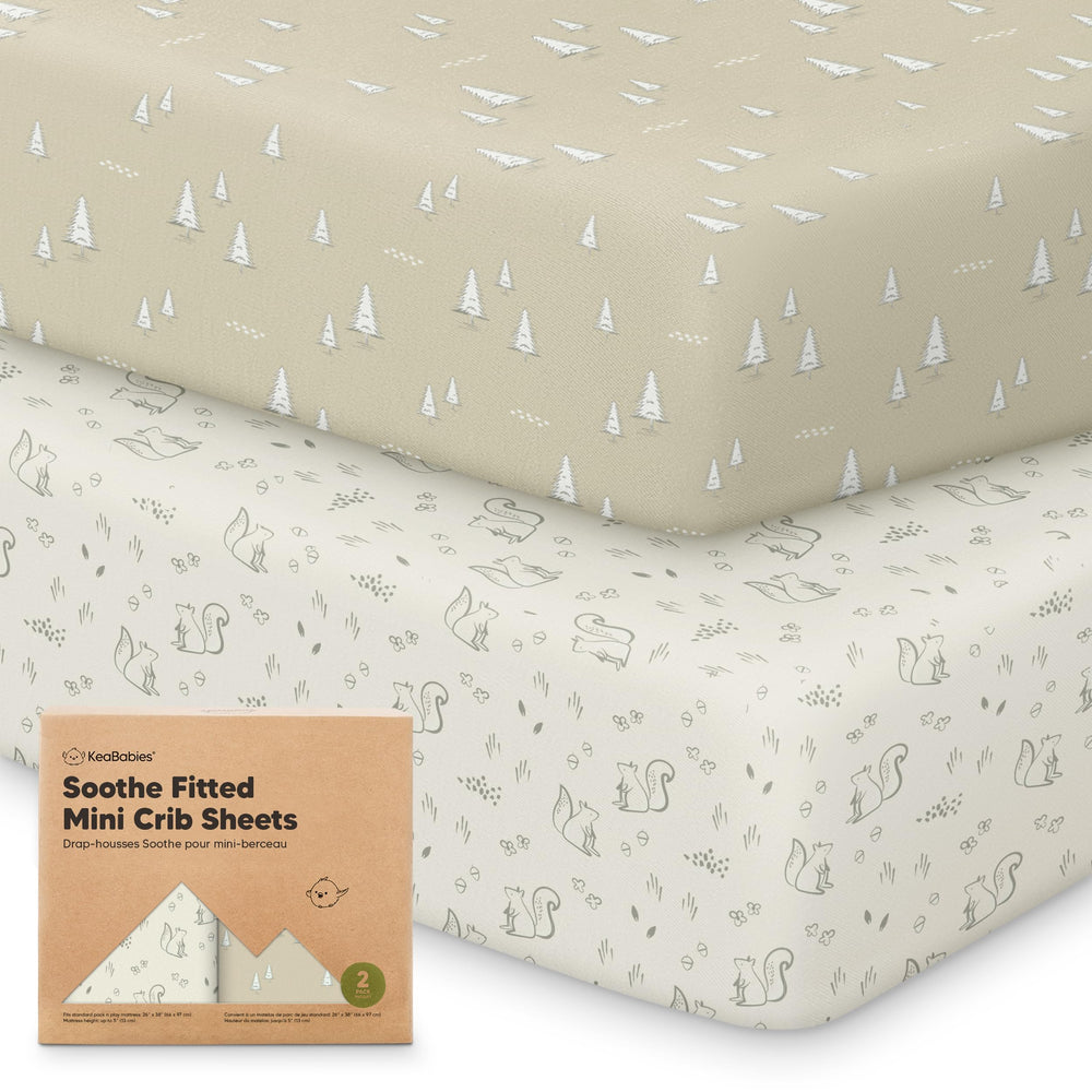 KeaBabies 2-pack mini crib sheets on a pack-n-play drawer showing fit and neutral Pine Grove color for unisex nursery