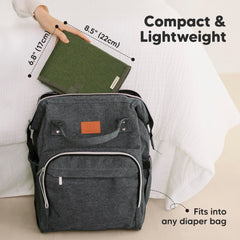 KeaBabies portable changing pad in olive green, folded compact, fits easily in your diaper bag.