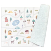 Keiki Care reversible play mat design A close-up shows padded comfort for safe tummy time.