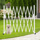 KENNISI metal expandable dog gate extended to nine feet for versatile doorway control.