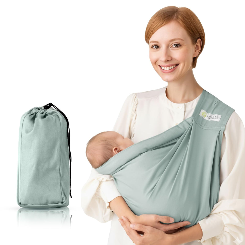kerätä baby sling green worn by parent outdoors for hands-free comfort