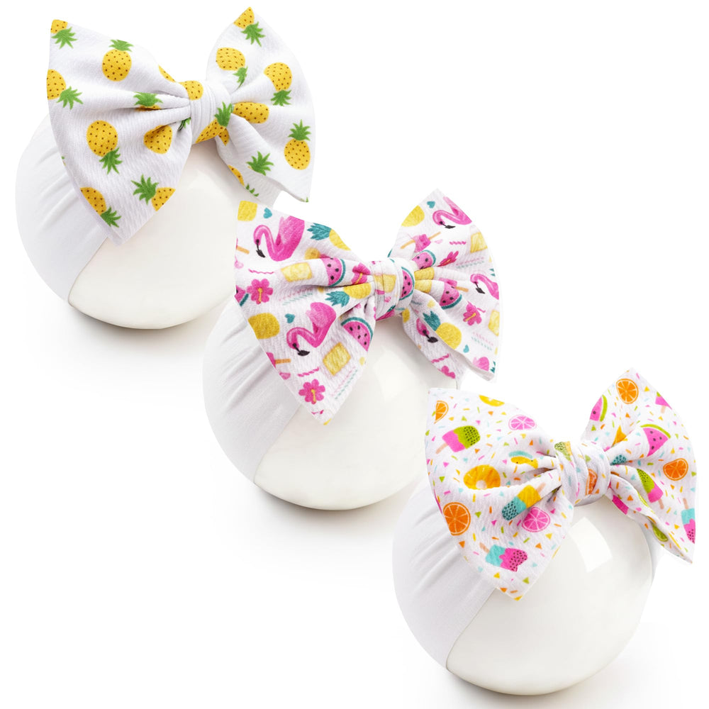 kexinstar baby bow headbands 3-pcs set on baby girl showing soft nylon comfort.