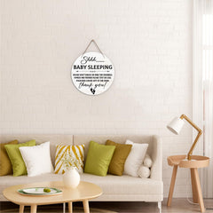 KFNER Baby Sleeping Sign shows rustic wood texture with vibrant print.