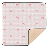 KICPOAY pink checkered play mat folds for travel-friendly floor play.