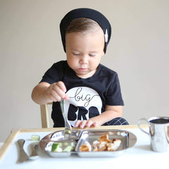 Kiddobloom kids butter knife shown for safe spreading with small hands