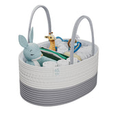 KiddyCare woven diaper caddy with handle lid for quick changes and portability.