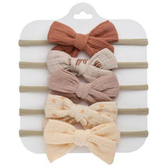 KIDOCHEESE baby bow in soft fabric for daily comfort.