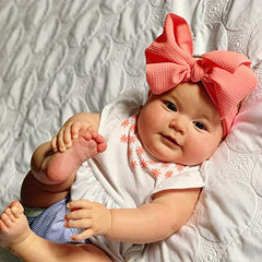 KIDOCHEESE Big Bows color variety display highlights soft fabric for comfortable wear.