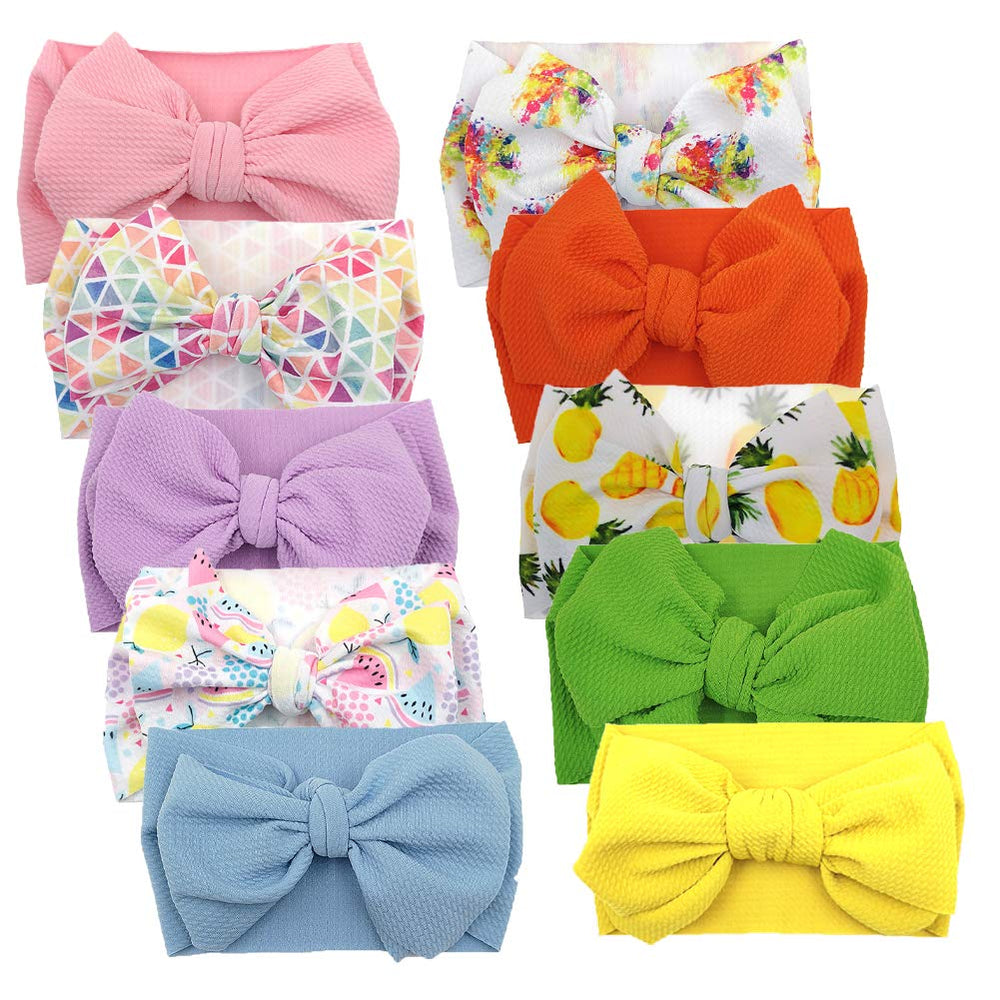 KIDOCHEESE big bows headband in pink color, soft elastic fit for newborns.