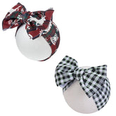KIDOCHEESE Christmas baby headband with large bow for festive photos.