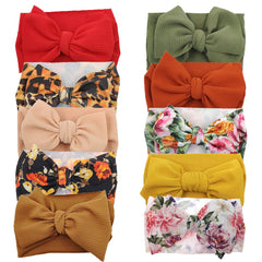 KIDOCHEESE oversized bow headband, multicolor pack, gentle elastic fit for newborns.