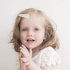 Kidocheese secure-grip-base clips stay in place on multiple hair types