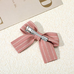 Kifmurase knotted bow hairpins emphasize safety and skin-friendly materials.
