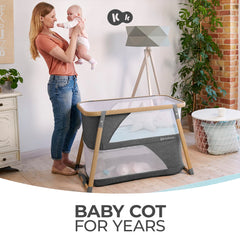 Kinderkraft Sofi mesh sides provide visibility and airflow for baby.