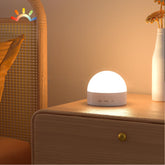 Kintion portable night light shows dimmable 8-color lighting for calming bedtimes.