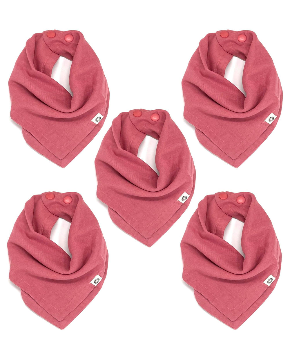 Kishu Baby Indi bandana bib in dusty rose folded for everyday wear and quick cleanup