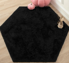 KIXINWA Black Hexagon Rug fluffy closeup highlights plush microfiber softness for cozy play.