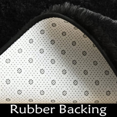 KIXINWA Black Hexagon Rug microfiber texture closeup shows subtle sheen and durability.