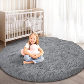 KIXINWA round rug with a soft hexagonal pattern adds cozy warmth to bedrooms.