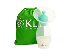 Klid Home manual breast milk collector side view shows compact, discreet design for on-the-go use.