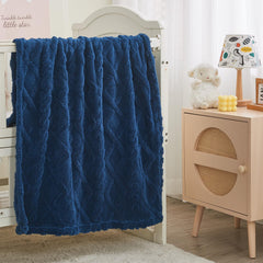 KMUSET Kids blue blanket draped over chair adds cozy color to living spaces.