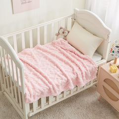 KMUSET Kids Pink Blanket draped in a living room adds soft decor.