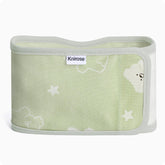Knirose Snuggle Strap wrapped around swaddle for secure, calming sleep.