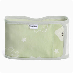 Knirose Snuggle Strap wrapped around swaddle for secure, calming sleep.