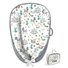Kombi Baby Lounger nest closeup shows breathable organic cotton and padded surround