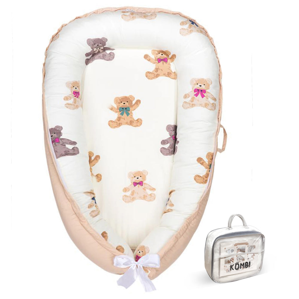 Kombi Baby Lounger ivory close-up showing soft organic cotton comfort for newborns.