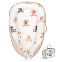 Kombi Baby Lounger ivory close-up showing soft organic cotton comfort for newborns.