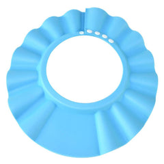 KOMIDK baby shower cap worn on head shields eyes from splashing water.