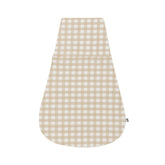 Konny Newborn Swaddle Pouch in creamy gingham on baby promotes snug comfort.