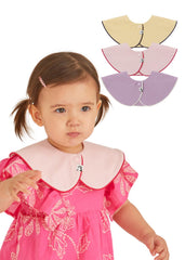 Konny Piped Edge Bib butter-yellow closeup—soft skin-friendly fabric for baby's comfort.