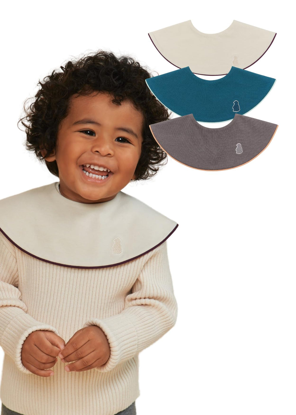 Konny Piped Edge Bib closeup shows soft neck fit for gentle irritation-free wear.
