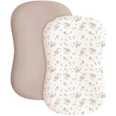 Konssy baby lounger cover Blossom Taupe folded shows soft fabric for baby comfort.