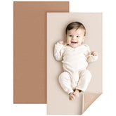 Konssy faux leather baby changing mat folded for travel in a diaper bag