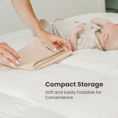 Konssy changing mat tucked into a diaper bag for on-the-go changes