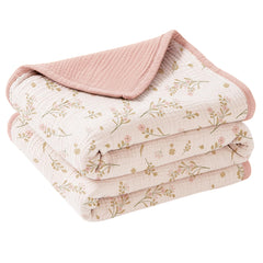 Konssy Muslin Blanket softness closeup highlights gentle touch for sensitive baby skin.