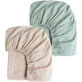 Konssy muslin crib sheets green-cream 2pcs set offers breathable comfort for baby.