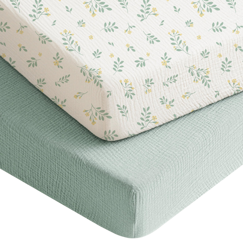 Konssy muslin crib sheets leaf print on green fabric for breathable sleep.
