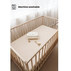 Konssy muslin crib sheets soft texture closeup highlighting skin-friendly softness.