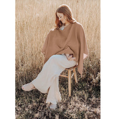 Konssy nursing cover shows 360-degree privacy during breastfeeding.