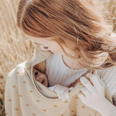 Konssy muslin nursing cover used as car seat cover.