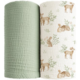 Konssy muslin swaddle blankets folded in woodland-sage colors for soft, breathable newborn coziness.