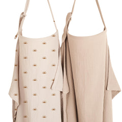 Konssy nursing cover with rigid hoop viewing window for eye contact.