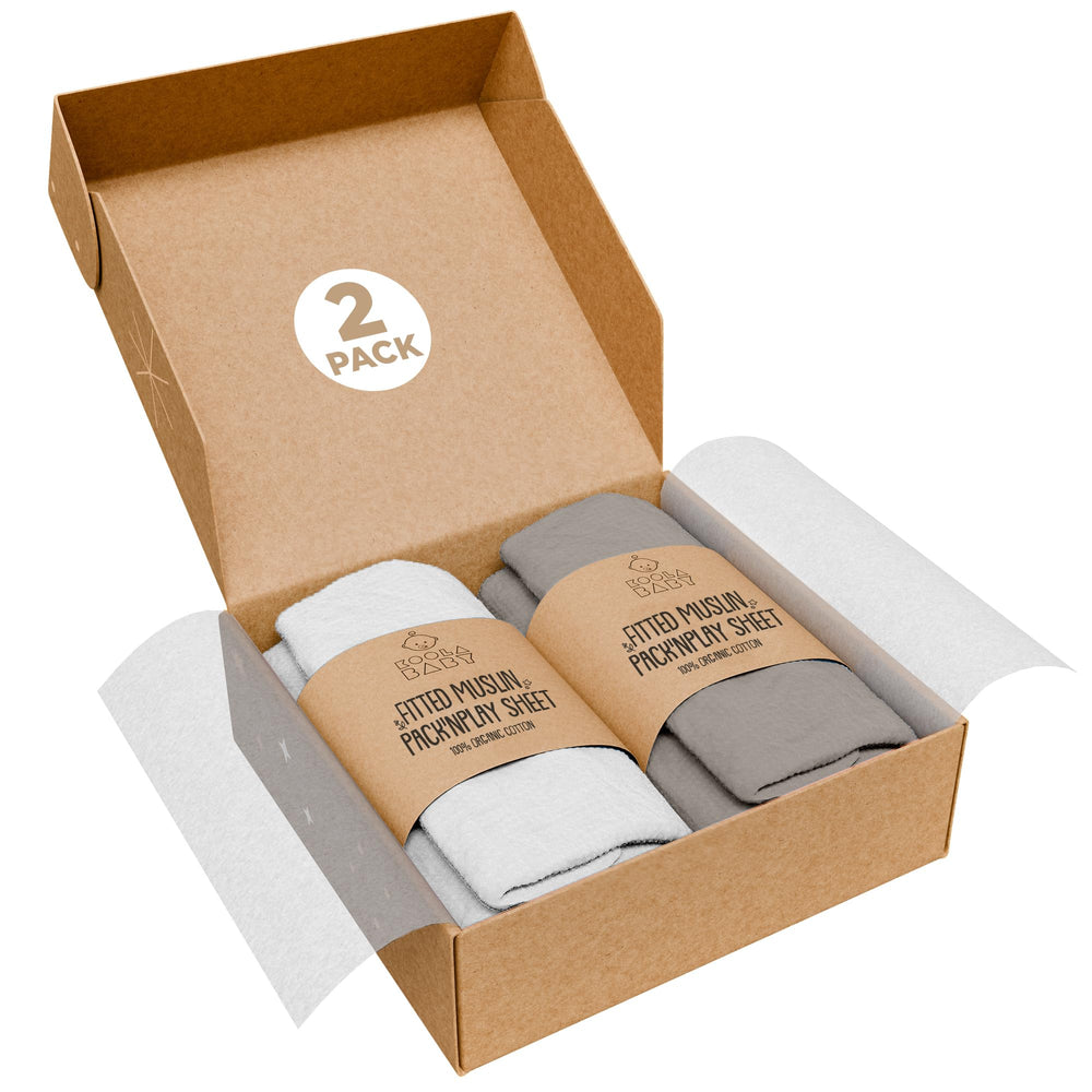 KoolerThings Pack and Play Sheets folded close-up showing ultra-soft organic cotton for baby comfort.