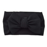 Koolgil baby girls 8-inch soft bow headband shown for comfortable all-day wear.